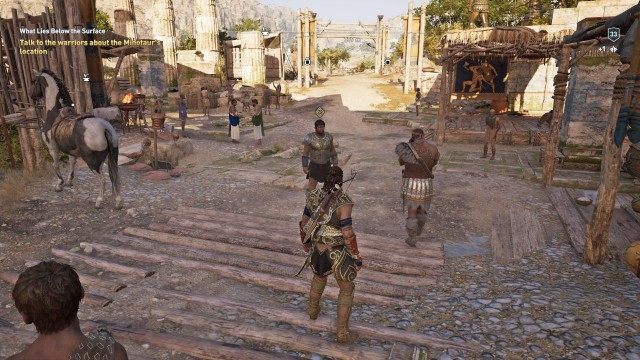 Talk to the warriors about the Minotaur's location