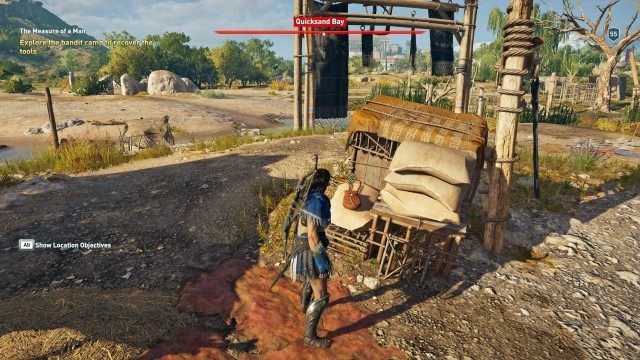 Explore the bandit camp to recover the tools