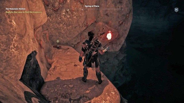 Explore the cave to find the treasure