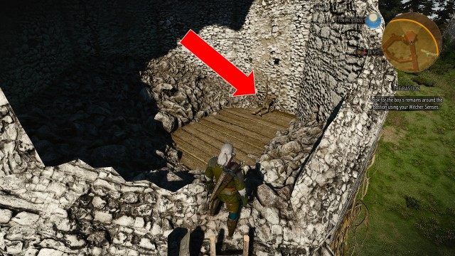 Look for the boy's remains around the bastion using your Witcher Senses.