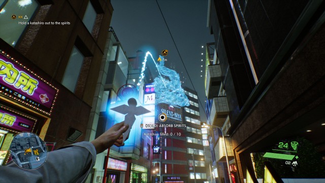 Hold a katashiro out to the spirits