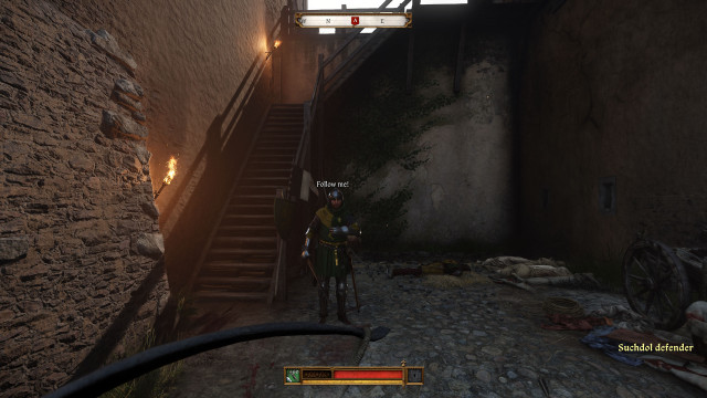 Go up the stairs to the front ramparts.