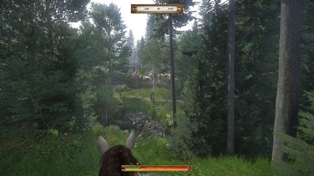 Carry on straight at the crossroads all the way to the camp.