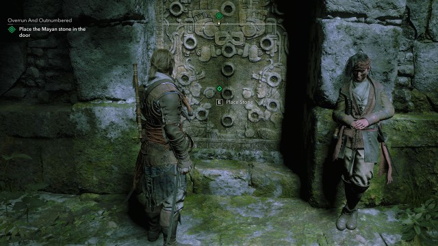 Place the Mayan stone in the door