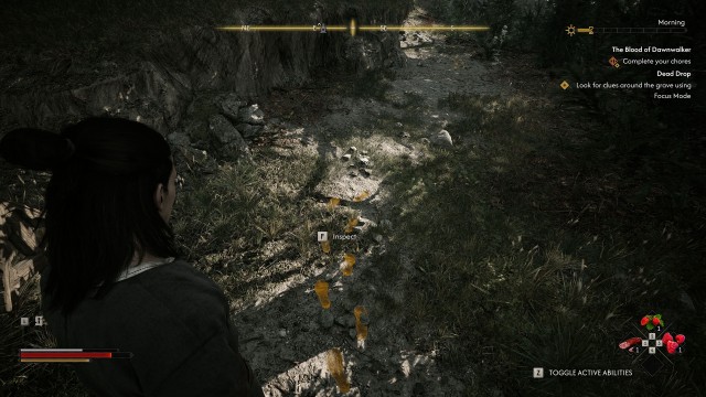 Look for clues around the grave using Focus Mode