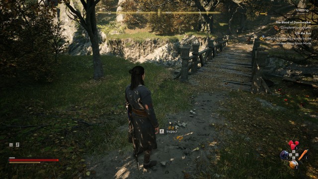 Search for the pig's tracks by the bridge using Focus Mode
